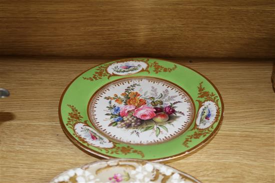 A small collection of decorative floral painted dessert dishes